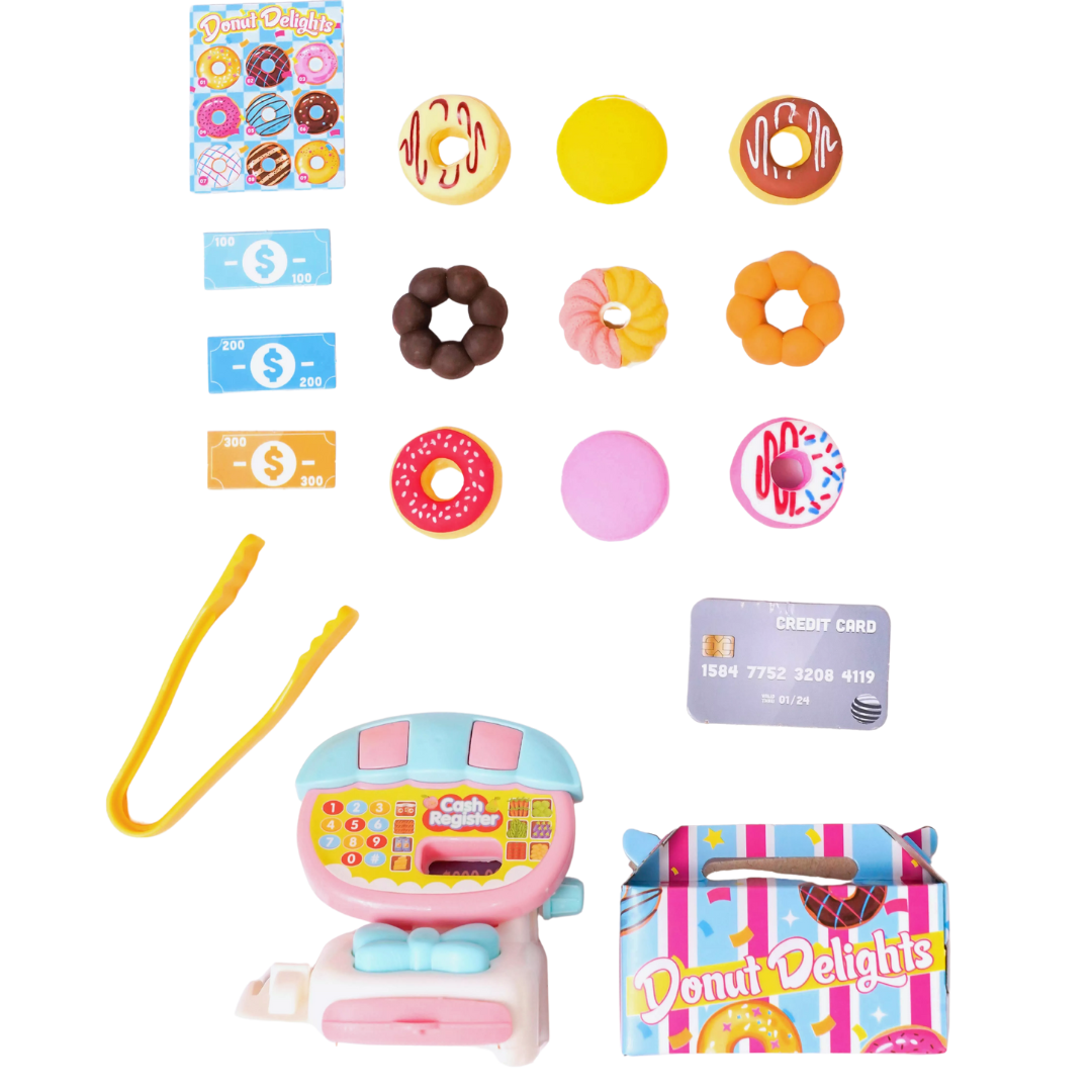 Toy cash register set with donut-themed items on a white background