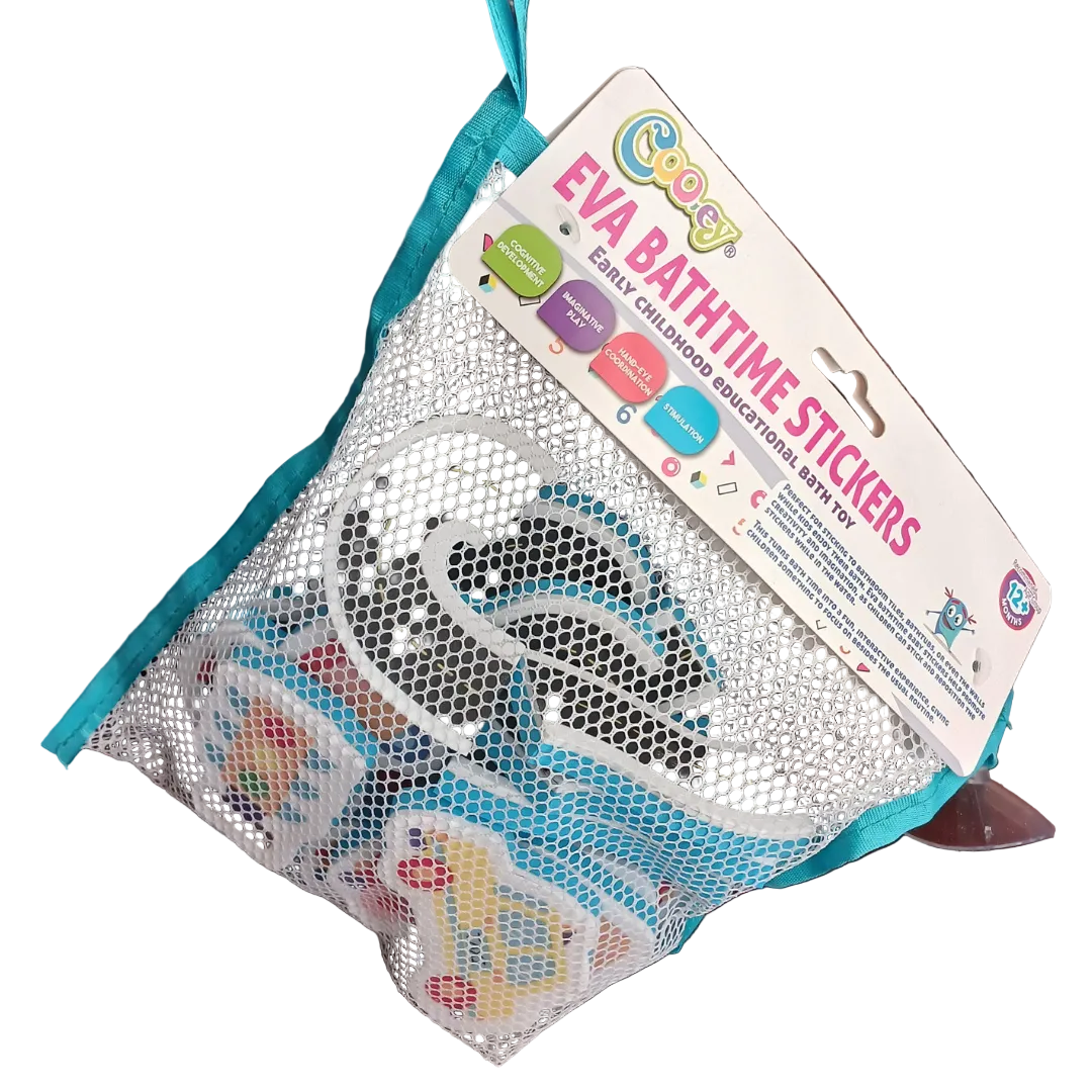 Cooey EVA Bathtime Stickers packaged in a white mesh net attached to a cardboard header card, showing a purple toy car piece, a curved road track piece, and a traffic light piece lying on a wooden surface below.
