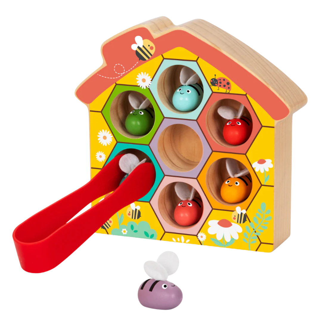 Wooden toy bee hive with colorful bee characters 