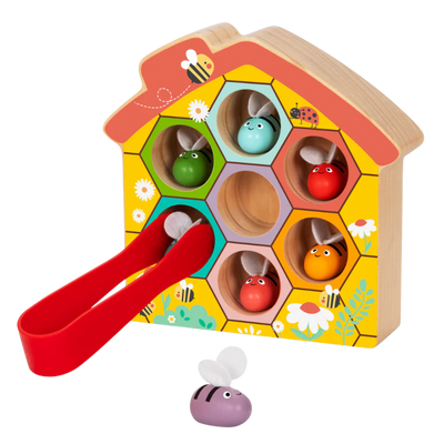 Wooden toy bee hive with colorful bee characters 