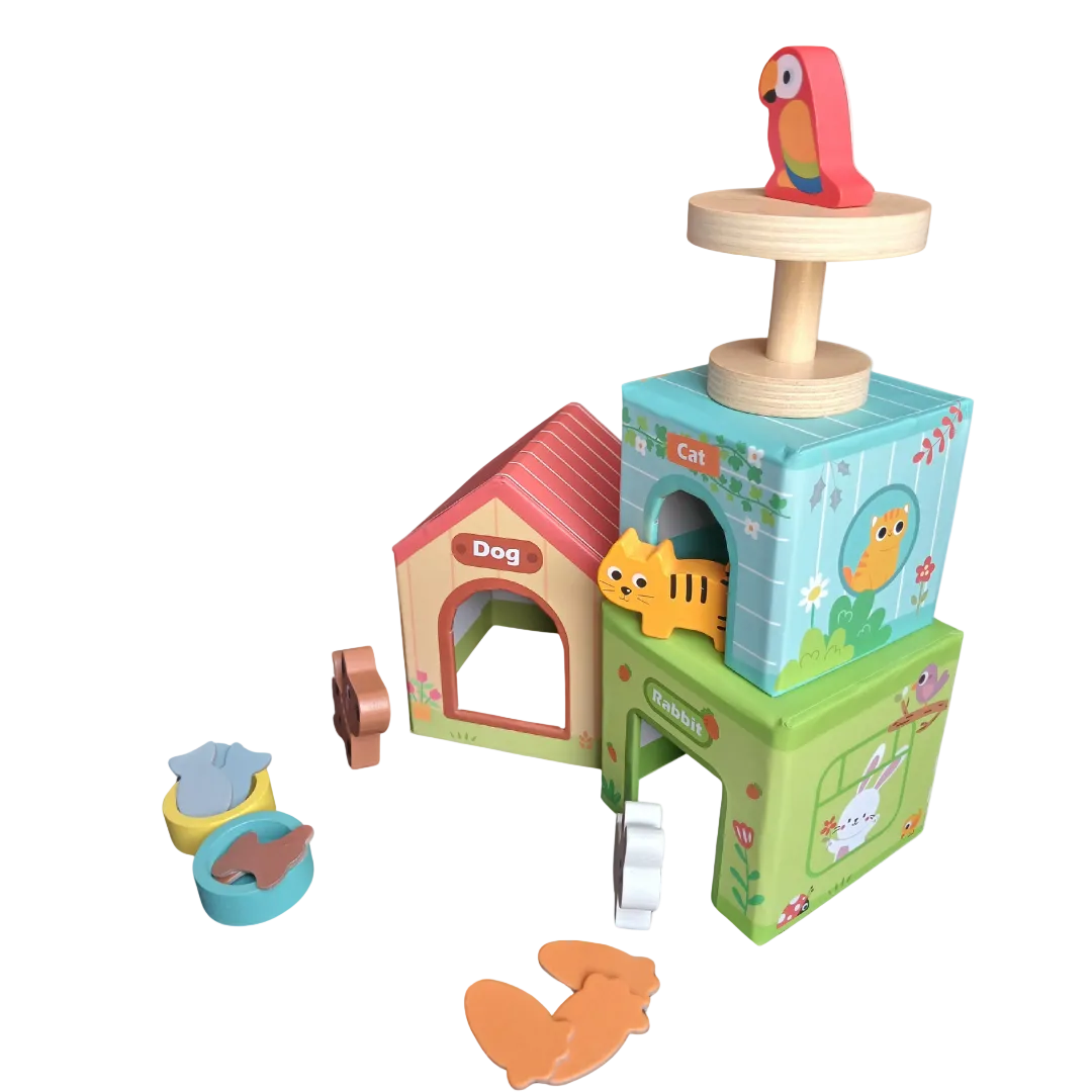 Three colorful wooden pet houses stacked with a wooden toy dog, cat, and rabbit sitting in front.