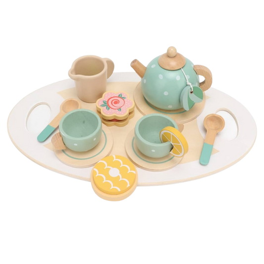 Wooden toy tea set with teapot, cups, and cookies on a white background
