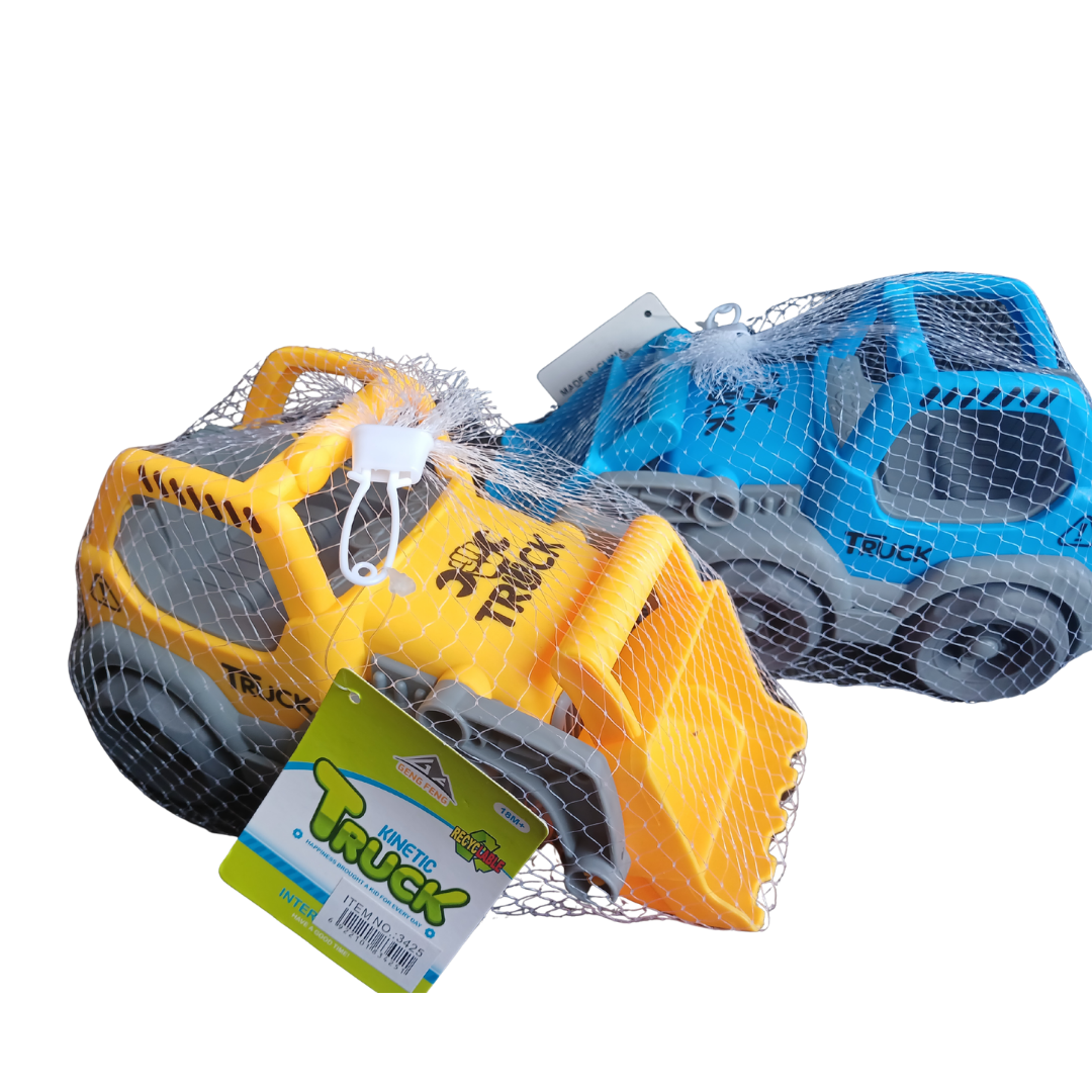 Two bright plastic Kinetic Trucks in mesh bags: one yellow front loader and one blue dump truck, designed for kinetic and sand play.