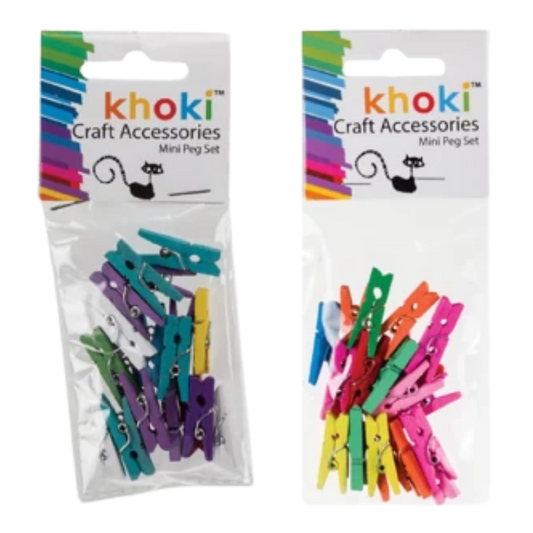 Khoki Craft Accessories Mini Peg Sets filled with small, colorful wooden craft pegs in shades of pink, green, yellow, blue, and red against a dark background.