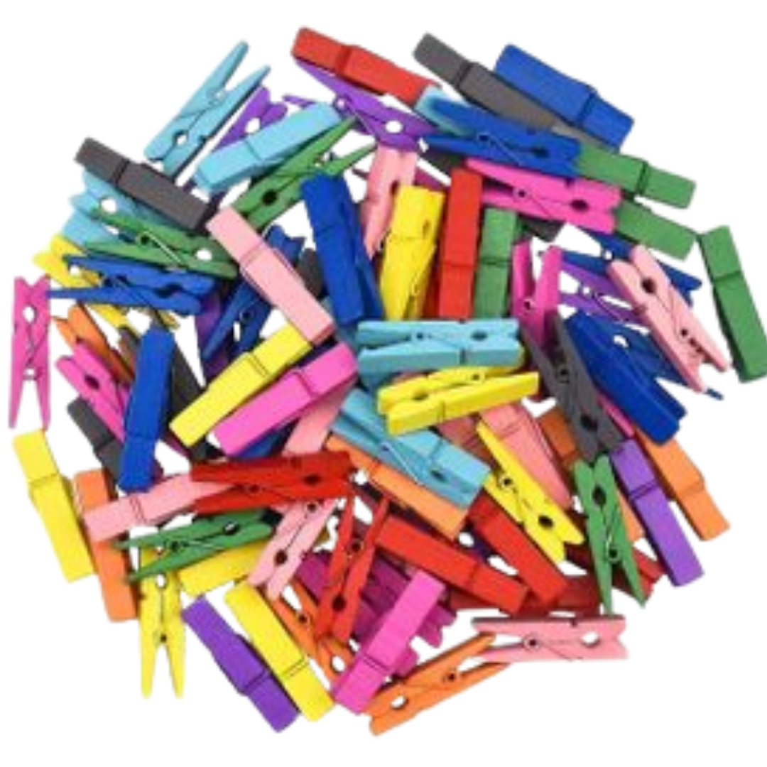 Khoki Craft Accessories Mini Peg Sets filled with small, colorful wooden craft pegs in shades of pink, green, yellow, blue, and red against a dark background.