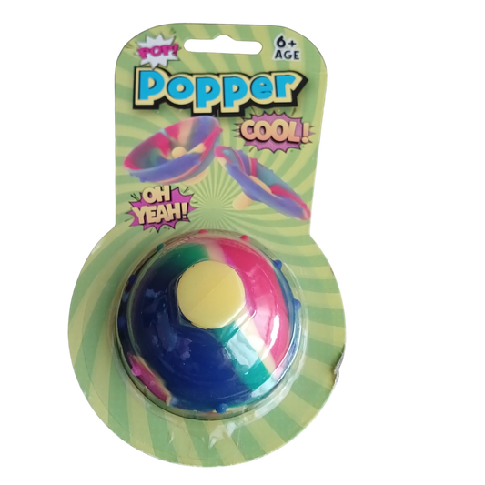 Retro Cool Tie-Dye Rubber Hip Popper toy in original green blister card packaging showing age 6 plus rating as referenced in Popper