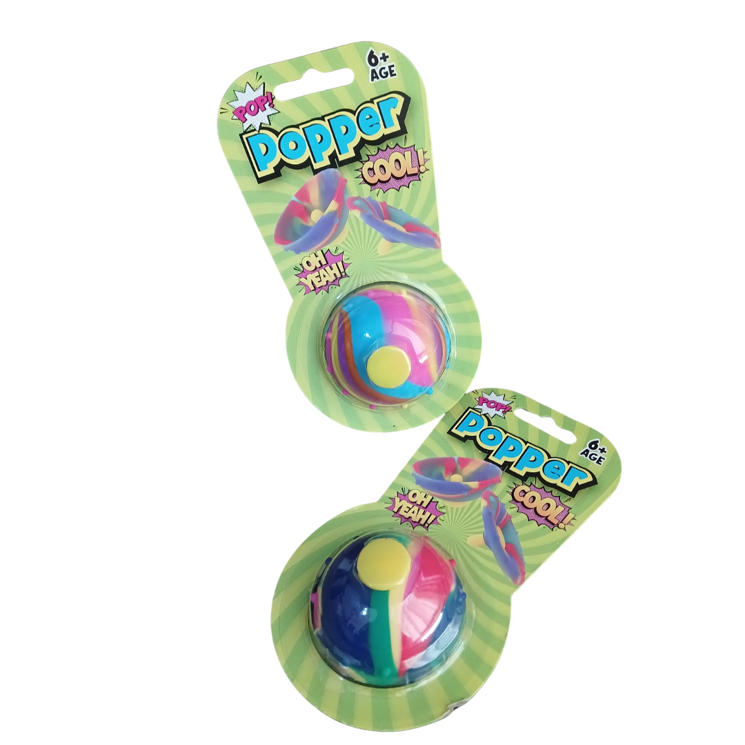 Retro Cool Tie-Dye Rubber Hip Popper toy in original green blister card packaging showing age 6 plus rating as referenced in Popper