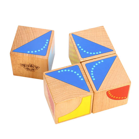 Tooky Toy Wooden geometric shape blocks with blue and red shapes background