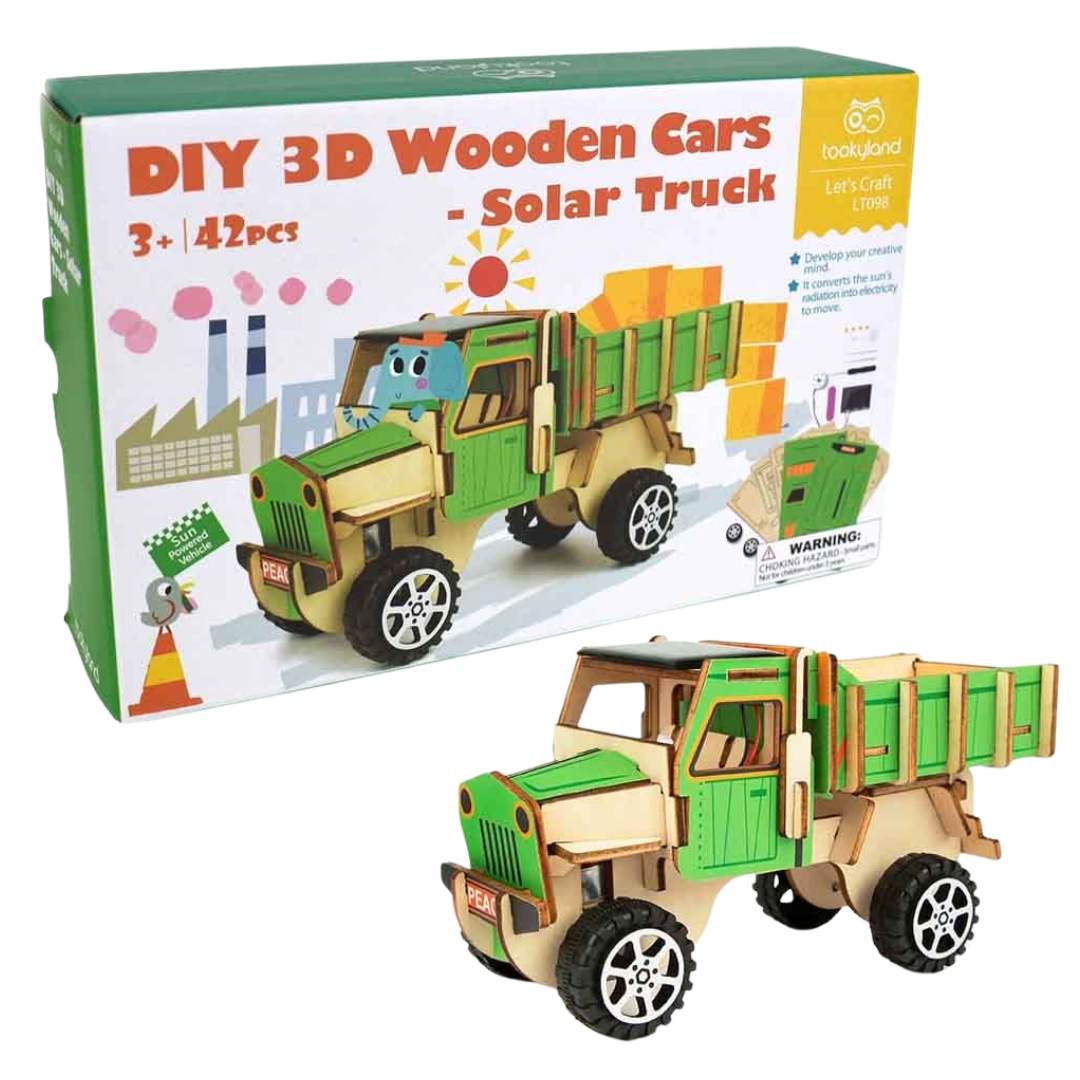 The Tookyland DIY 3D Wooden Solar Truck kit box and the assembled green and white wooden dump truck model with a solar panel on the roof.