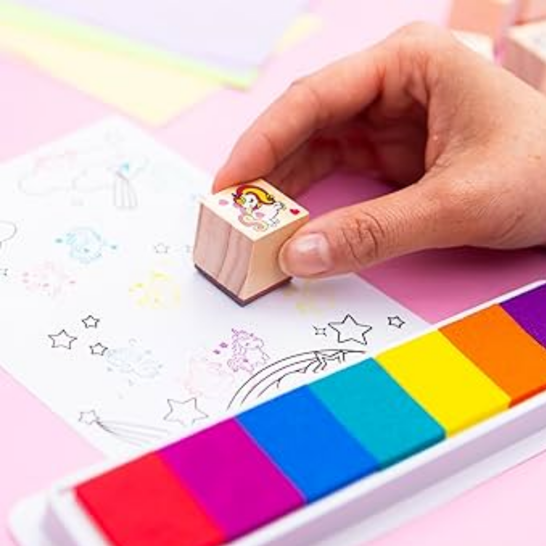 Magical Unicorn stamper set with wooden stamps, colorful ink pad, and activity book in a wooden tray