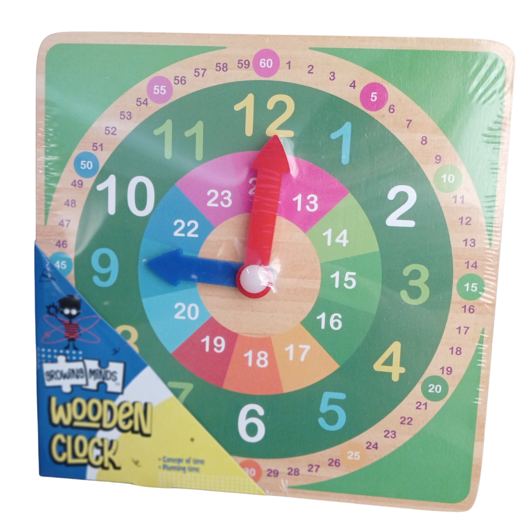 A square wooden educational teaching clock from Growing Minds featuring a colorful face with green, blue, and pink rings, individual 1 to 60 minute marks, an inner 24-hour track, and red and blue movable plastic hands.